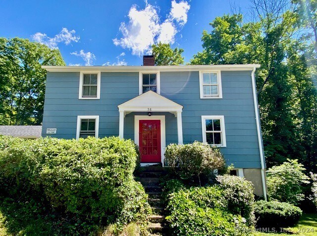 58 Middle Haddam Rd, East Hampton, CT 06456 - colonial inspired home featuring a chimney