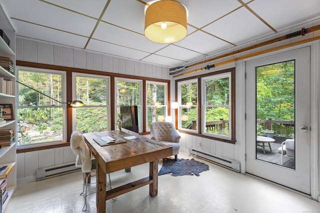 58 Middle Haddam Rd, East Hampton, CT 06456 - home office featuring a baseboard heating unit, wood walls, and tile patterned floors