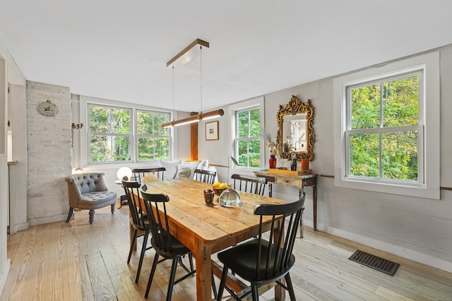 58 Middle Haddam Rd, East Hampton, CT 06456 - dining area with light wood-style flooring and plenty of natural light