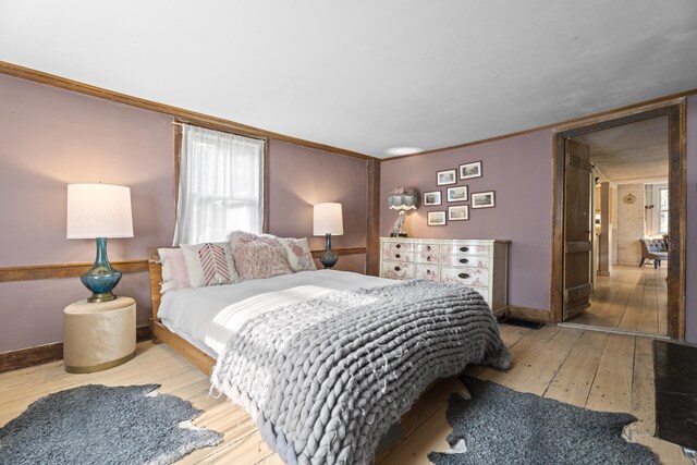 58 Middle Haddam Rd, East Hampton, CT 06456 - bedroom featuring hardwood / wood-style flooring, ornamental molding, and baseboards