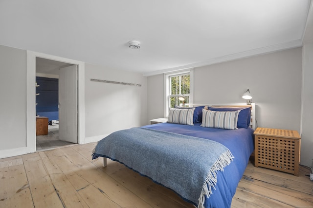 58 Middle Haddam Rd, East Hampton, CT 06456 - bedroom with wood-type flooring and baseboards