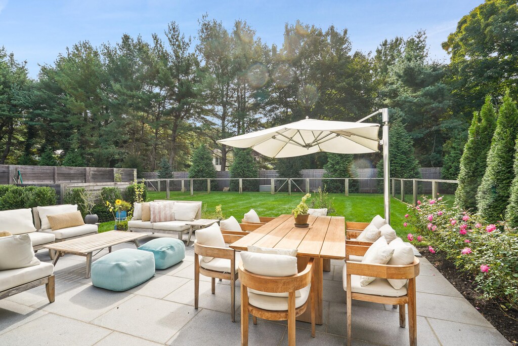 view of patio with a fenced backyard, an outdoor living space, and outdoor dining area