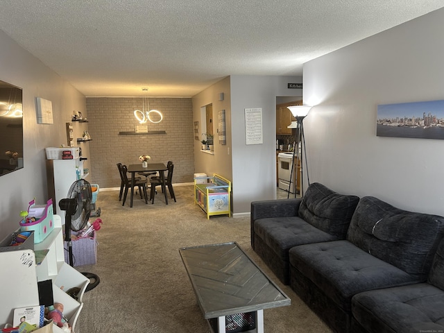 173 Russo Ave Unit 610, East Haven, CT 06513 - carpeted living area featuring a chandelier and a textured ceiling