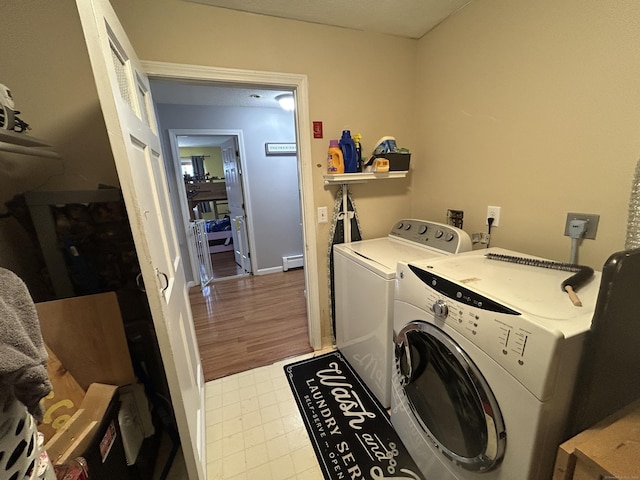 173 Russo Ave Unit 610, East Haven, CT 06513 - laundry area featuring independent washer and dryer and a baseboard radiator