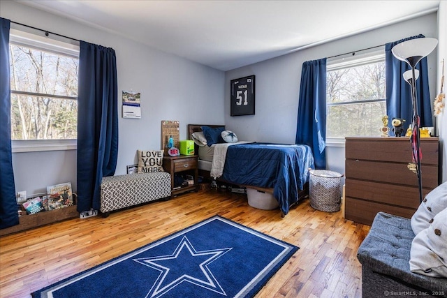 bedroom featuring wood-type flooring