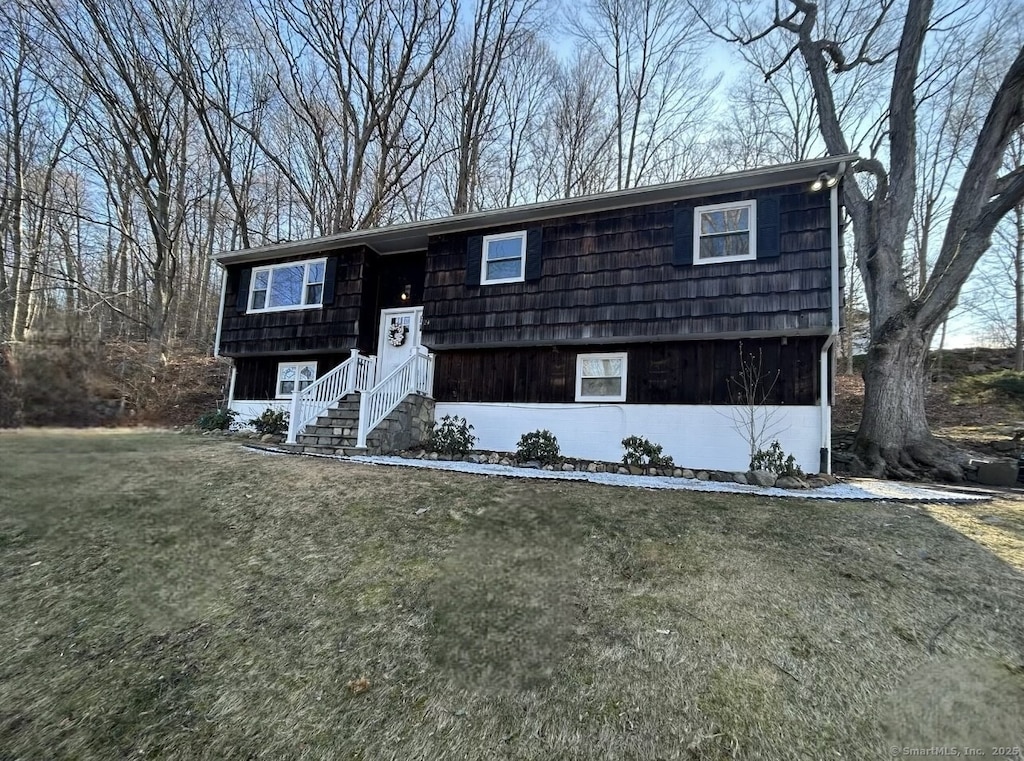 24 Hudson Dr, New Fairfield, CT 06812 - raised ranch featuring entry steps and a front lawn