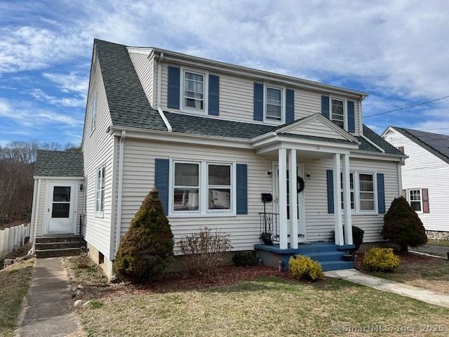 12 Avery St, Stonington, CT 06379 - view of front of home with a shingled roof and a front yard