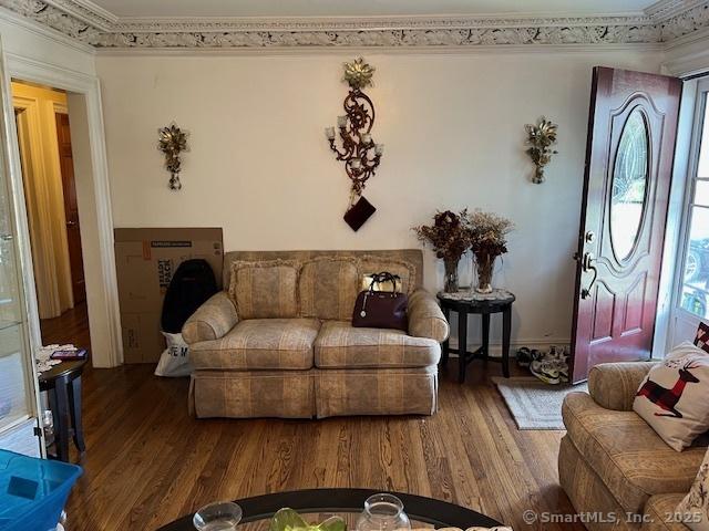 12 Avery St, Stonington, CT 06379 - living area featuring wood finished floors and ornamental molding