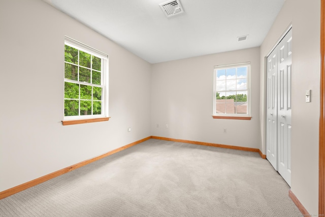 32 Pheasant Hill Dr Unit 32, Enfield, CT 06082 - unfurnished room featuring healthy amount of natural light and light colored carpet