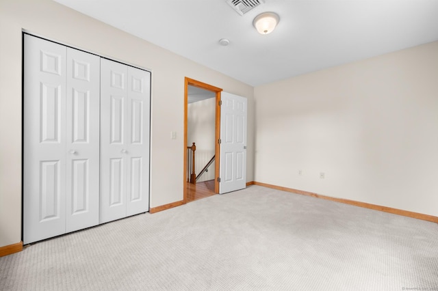 32 Pheasant Hill Dr Unit 32, Enfield, CT 06082 - unfurnished bedroom featuring light carpet and a closet