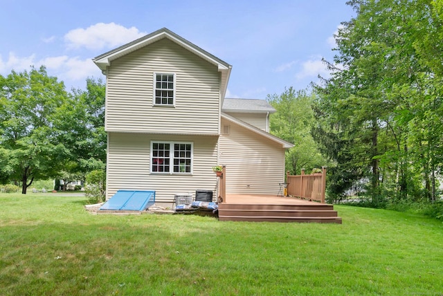 32 Pheasant Hill Dr Unit 32, Enfield, CT 06082 - rear view of property with a wooden deck and a yard