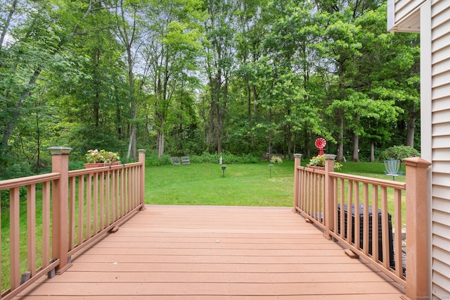 32 Pheasant Hill Dr Unit 32, Enfield, CT 06082 - wooden deck with a yard and view of wooded area