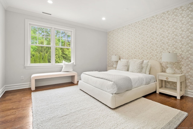 bedroom featuring wallpapered walls, baseboards, crown molding, dark wood-style flooring, and recessed lighting
