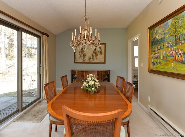 dining room with a baseboard heating unit, an inviting chandelier, plenty of natural light, and light colored carpet