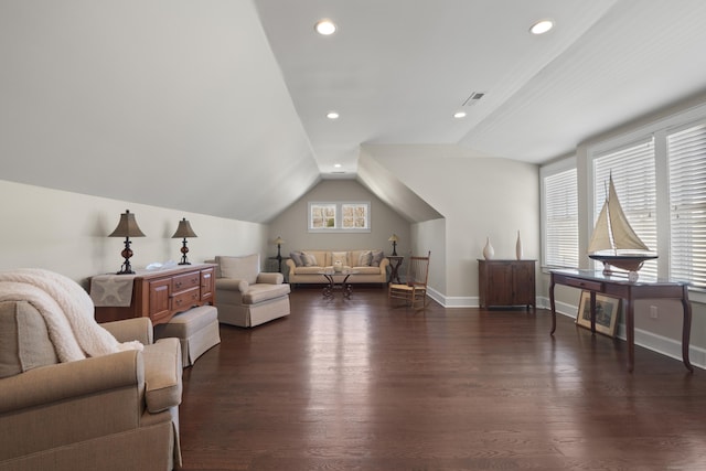 interior space featuring baseboards, vaulted ceiling, dark wood-style floors, and recessed lighting