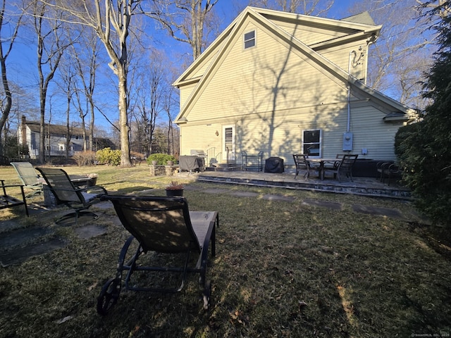 16 Fullmar Ln, Norwalk, CT 06850 - back of property with a patio and a yard