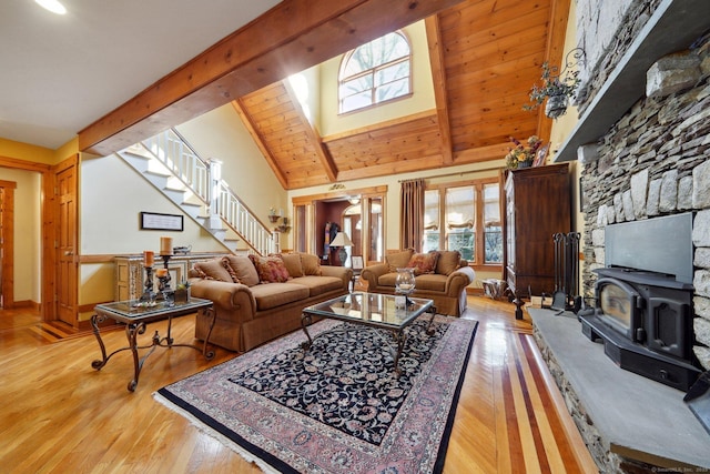 16 Fullmar Ln, Norwalk, CT 06850 - living area with healthy amount of natural light, stairway, light wood finished floors, beamed ceiling, and high vaulted ceiling