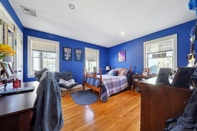 16 Fullmar Ln, Norwalk, CT 06850 - bedroom featuring multiple windows, light wood-style flooring, and recessed lighting