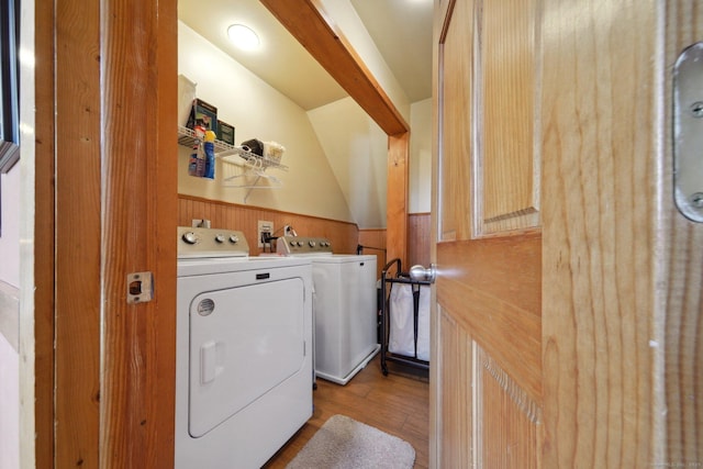 16 Fullmar Ln, Norwalk, CT 06850 - laundry room with separate washer and dryer, wood finished floors, and a wainscoted wall
