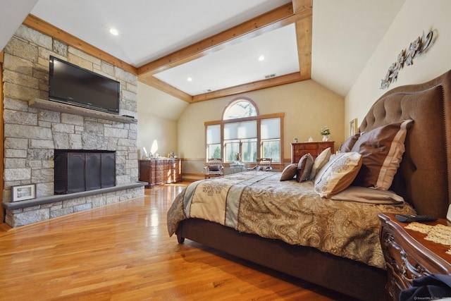 16 Fullmar Ln, Norwalk, CT 06850 - bedroom with wood finished floors and a stone fireplace