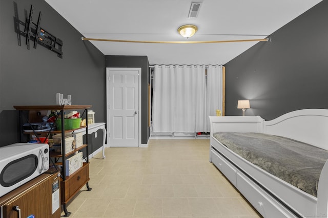 bedroom with visible vents