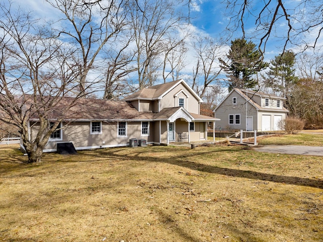 106 Chesterfield Rd, East Lyme, CT 06333 - traditional-style house with a front lawn, a porch, and cooling unit