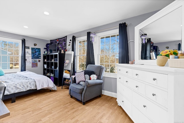 106 Chesterfield Rd, East Lyme, CT 06333 - bedroom with multiple windows, light wood-type flooring, recessed lighting, and baseboards