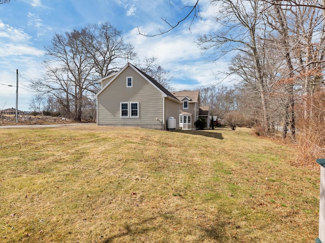 106 Chesterfield Rd, East Lyme, CT 06333 - view of home's exterior featuring a yard and a shingled roof