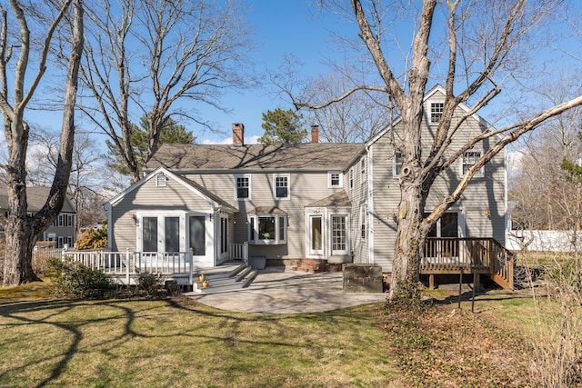 387 N River St, Guilford, CT 06437 - rear view of property with a deck, a patio area, and a yard