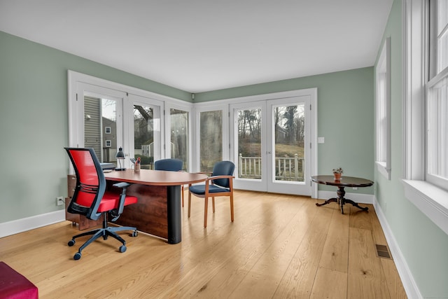 387 N River St, Guilford, CT 06437 - office with wood-type flooring, baseboards, and french doors