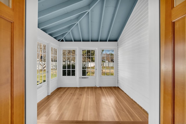 387 N River St, Guilford, CT 06437 - unfurnished sunroom featuring french doors, wood-type flooring, healthy amount of natural light, and wooden walls