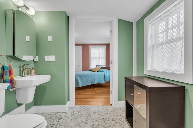 387 N River St, Guilford, CT 06437 - bathroom with toilet, wood finished floors, and ensuite bath