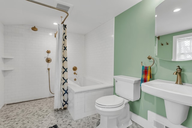 387 N River St, Guilford, CT 06437 - full bath with toilet, tiled shower / bath combo, recessed lighting, and baseboards