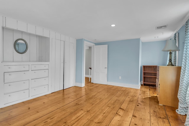 387 N River St, Guilford, CT 06437 - unfurnished bedroom featuring light wood finished floors, baseboards, and recessed lighting