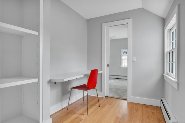387 N River St, Guilford, CT 06437 - office with a baseboard radiator, wood finished floors, baseboards, and lofted ceiling
