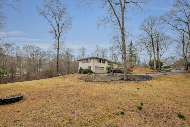 view of yard with an attached garage