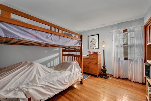bedroom with light wood-type flooring