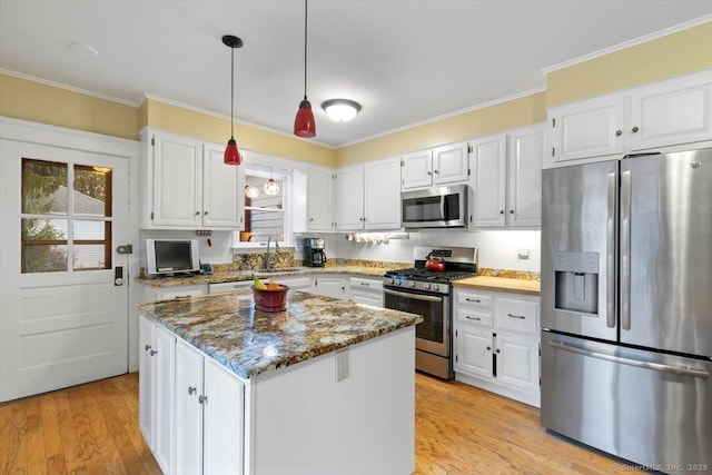3 Middle Rd, Hamden, CT 06517 - kitchen with a sink, ornamental molding, white cabinetry, stainless steel appliances, and stone counters