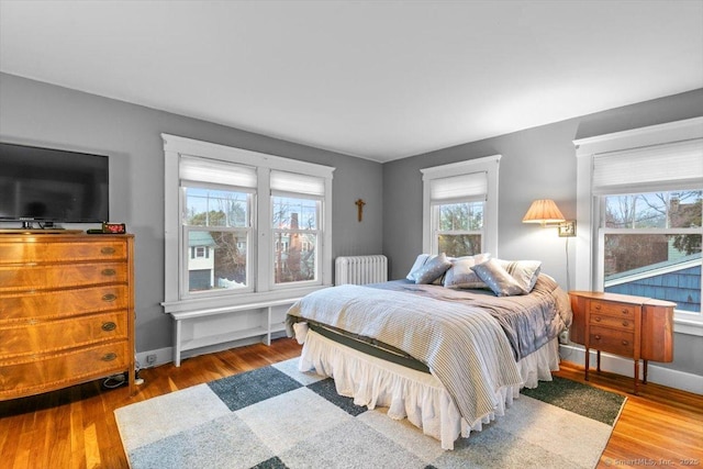 3 Middle Rd, Hamden, CT 06517 - bedroom with radiator heating unit and wood finished floors