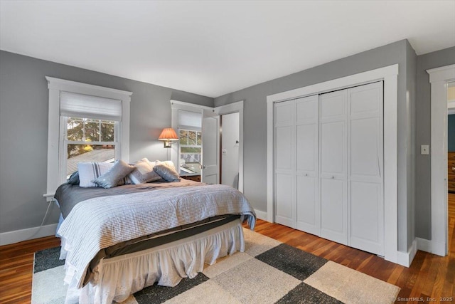 3 Middle Rd, Hamden, CT 06517 - bedroom featuring a closet, baseboards, and wood finished floors