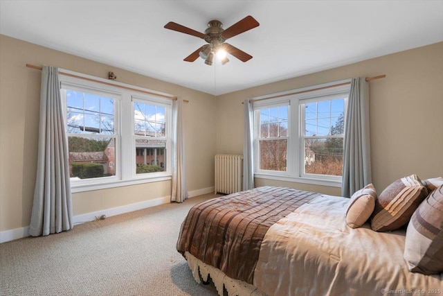 3 Middle Rd, Hamden, CT 06517 - bedroom with radiator heating unit, multiple windows, baseboards, and carpet floors