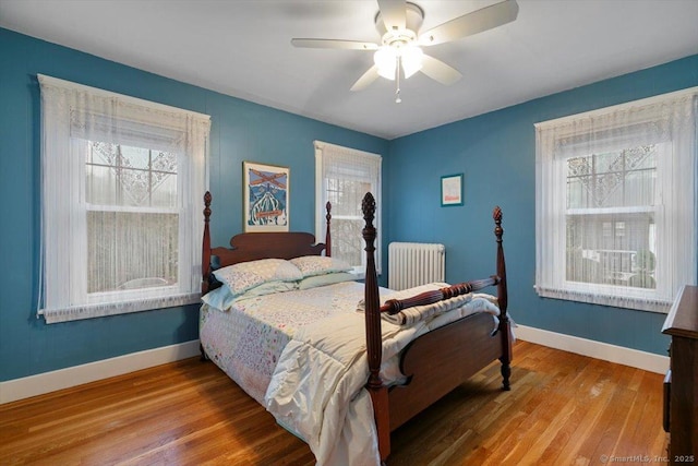 3 Middle Rd, Hamden, CT 06517 - bedroom featuring radiator heating unit, ceiling fan, baseboards, and wood finished floors