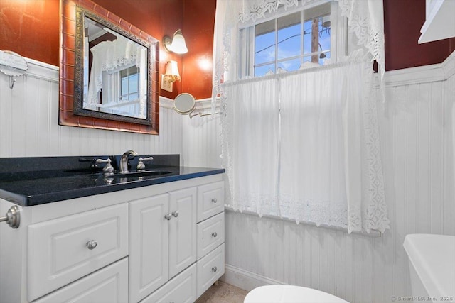 3 Middle Rd, Hamden, CT 06517 - half bathroom with toilet, a wainscoted wall, and vanity