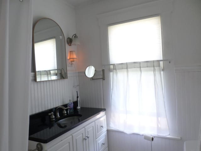3 Middle Rd, Hamden, CT 06517 - bathroom featuring a wainscoted wall and vanity