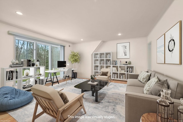 living room with recessed lighting, wood finished floors, and visible vents