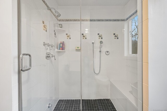 full bathroom featuring a stall shower