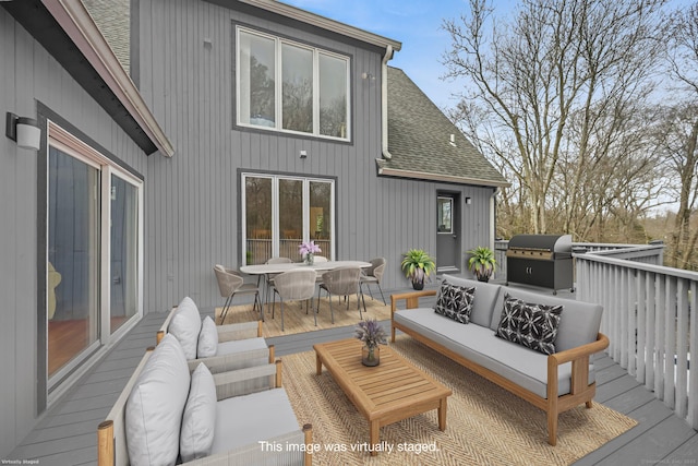 wooden deck featuring an outdoor hangout area, outdoor dining space, and area for grilling