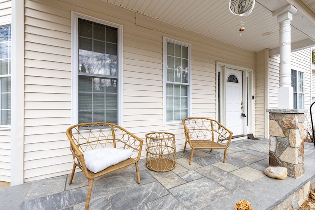 view of patio featuring a porch