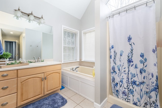 bathroom with vaulted ceiling, curtained shower, tile patterned flooring, and vanity