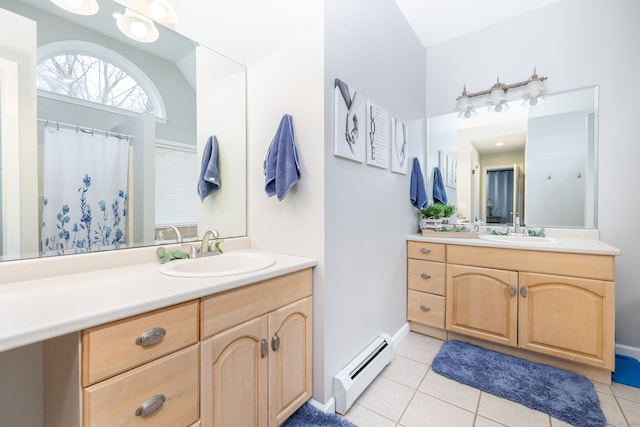 13 Sunset Ln, New Milford, CT 06776 - bathroom with a baseboard heating unit, vanity, and tile patterned floors